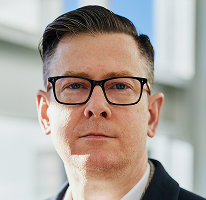 Alexander Hughes, VD på ett kryptotradingbolag, porträtt